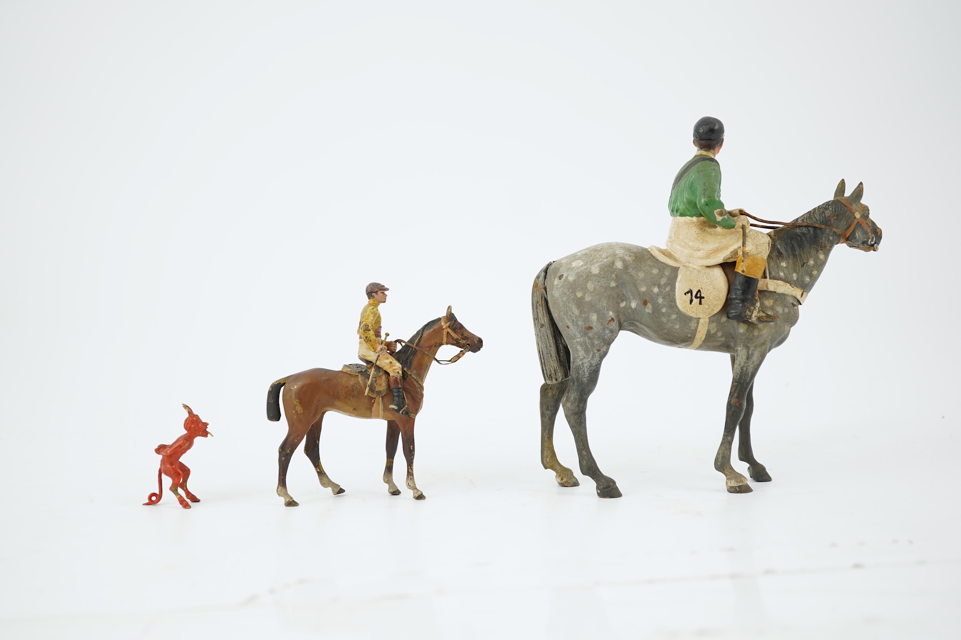 Two Austrian cold-painted bronze figures groups of jockeys on racehorses, early 20th century